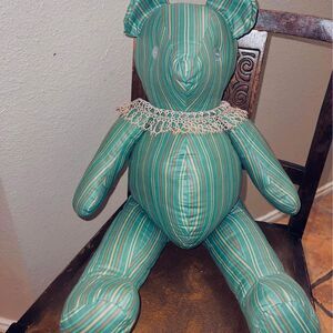 dapper homemade pinstriped stuffed handsome bear, pale green, arms and legs move